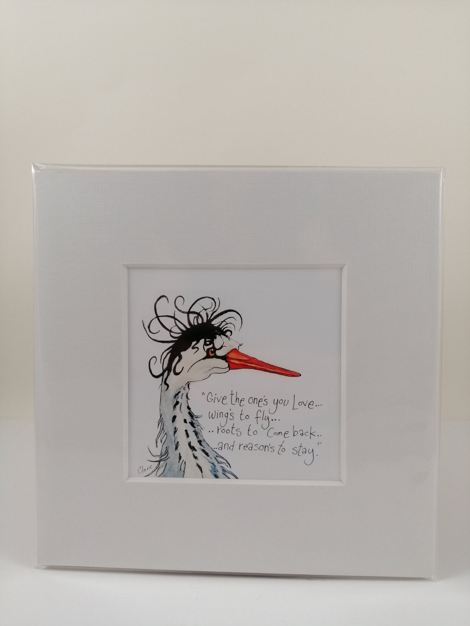 Mavis the Heron - Give the ones you love....wings to fly.....roots to come back....and reasons to stay. Mounted original smiley sketch.